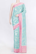 Light Blue Dual Tone Tussar Silk Saree with Zari Butta on the body and Zari Border displayed on a mannequin
