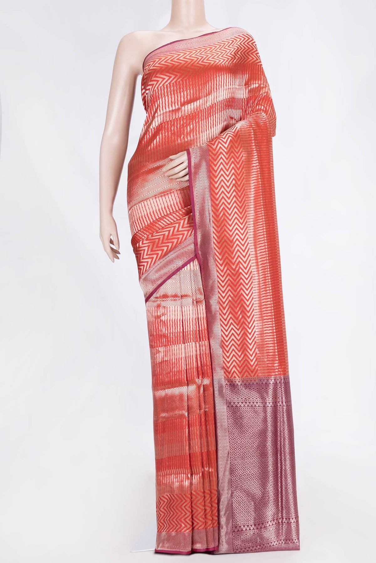 Red Dual Tone Banarasi Silk Saree with Zari Brocade on the body and Zari Border displayed on a mannequin