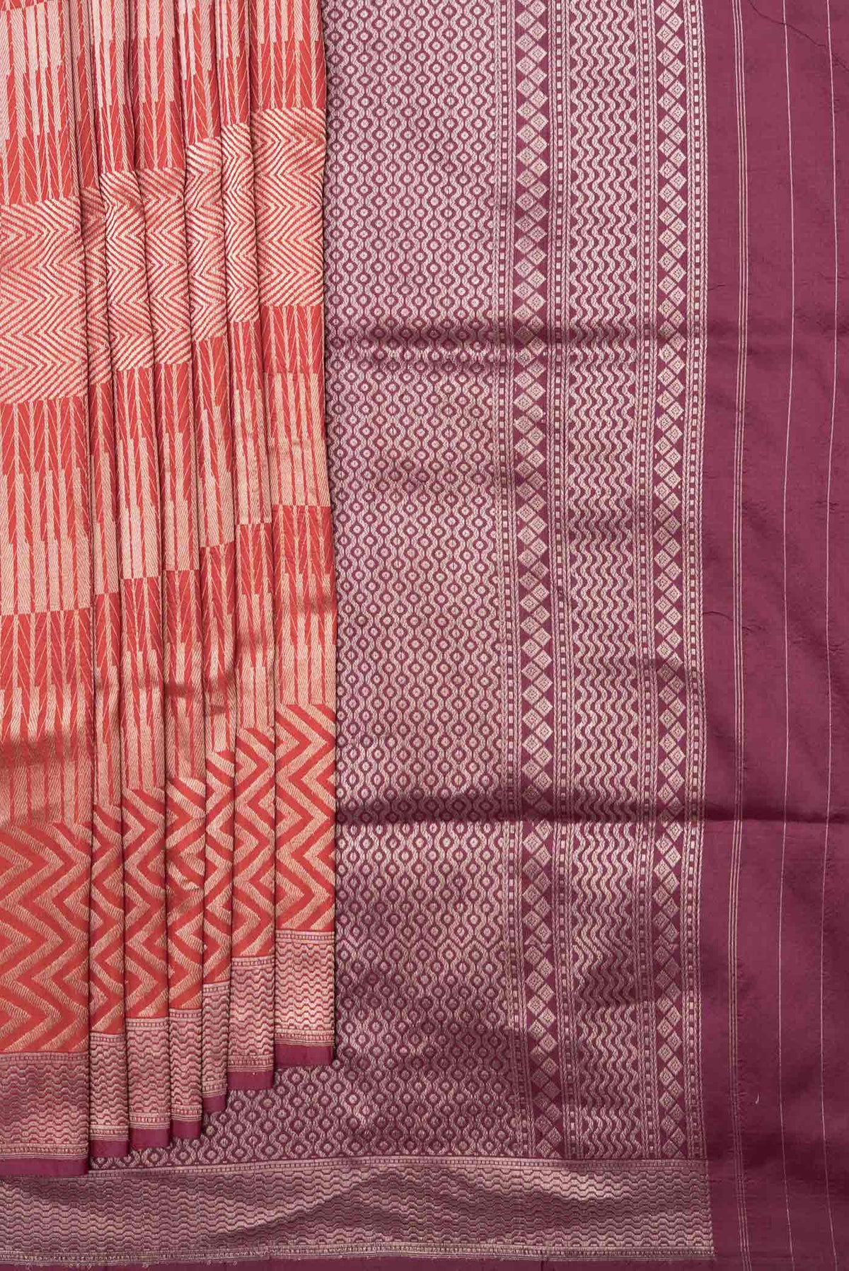 Pleats and pallu of Red Dual Tone Banarasi Silk Saree with Zari Brocade on the body and Zari Border