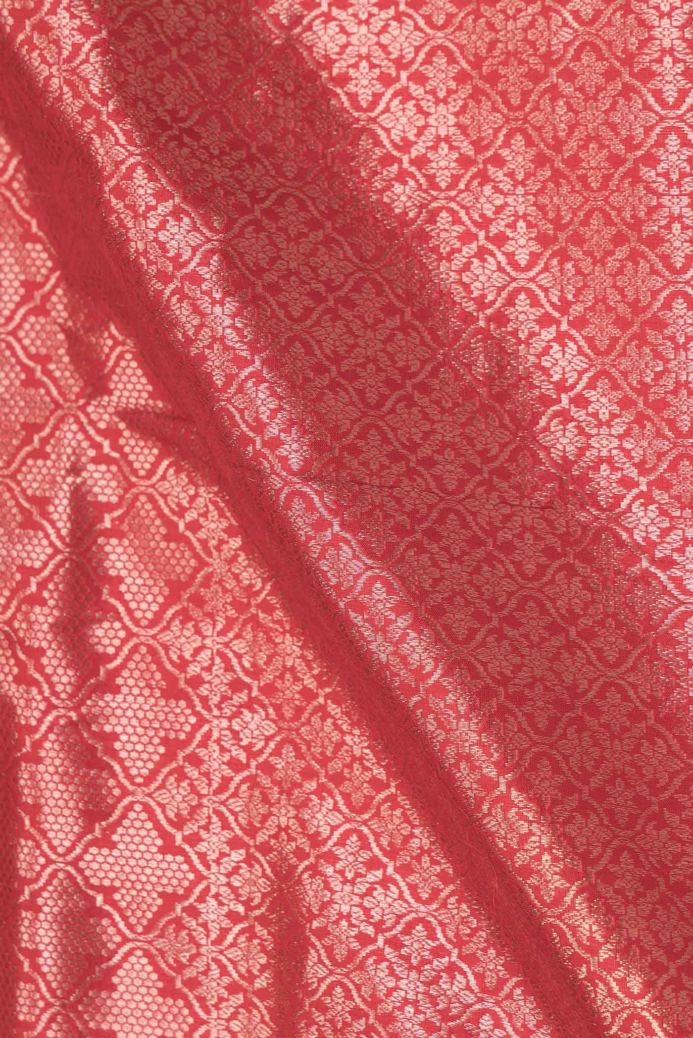 Close up of Red Dual Tone Banarasi Silk Saree with Zari Brocade on the body and Zari Border displaying folds
