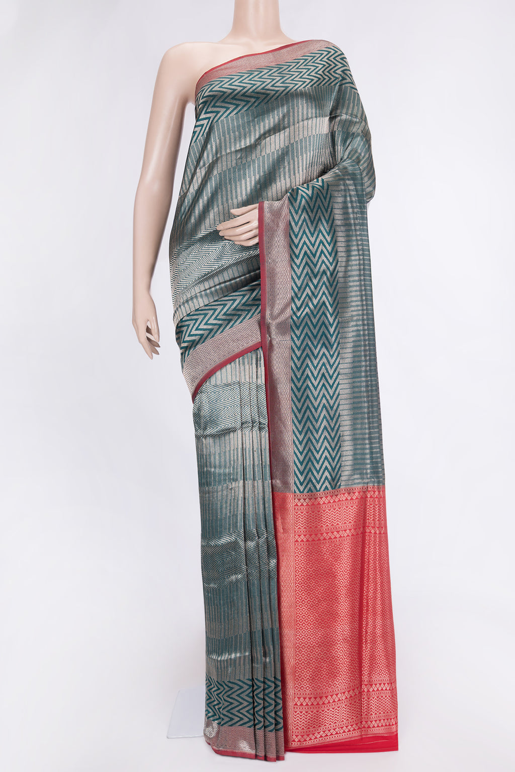 Green Dual Tone Banarasi Silk Saree with Zari Brocade on the body and Zari Border.  displayed on a mannequin