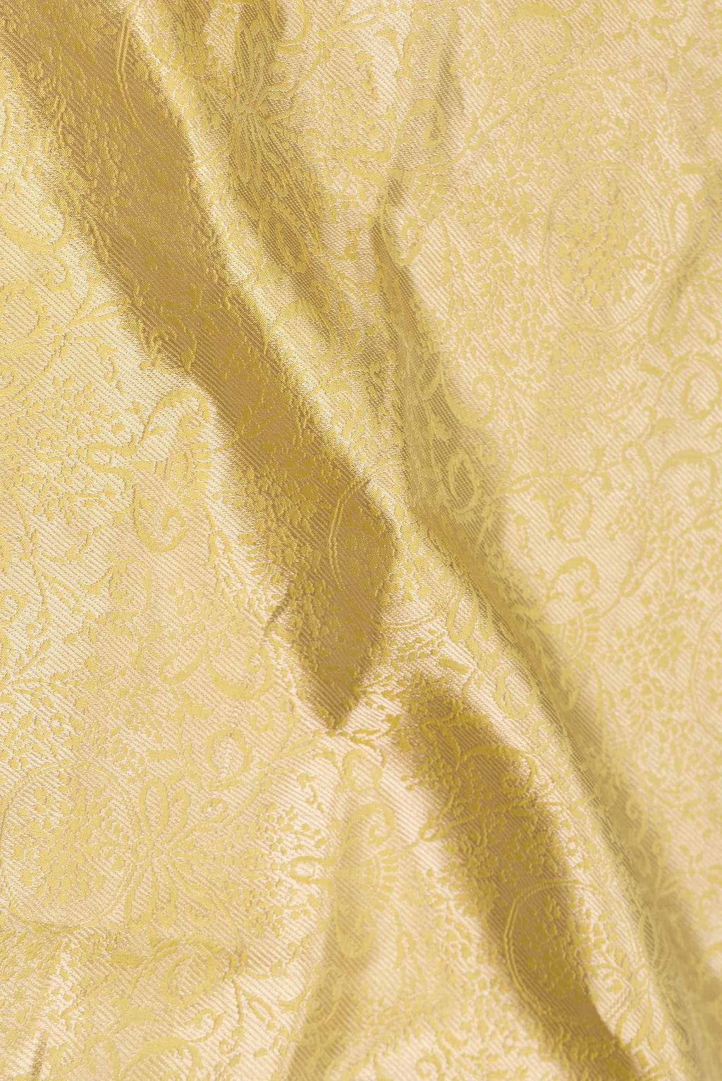 Close up of Light Green with Yellow Color Banarasi Silk Saree with Zari Brocade on the body and Zari Border displaying folds
