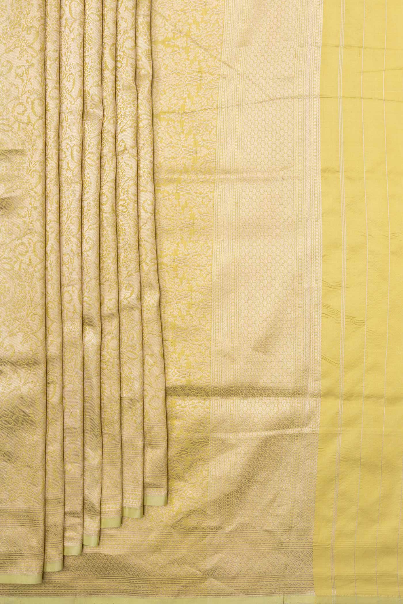 Pleats and pallu of Light Green with Yellow Color Banarasi Silk Saree with Zari Brocade on the body and Zari Border