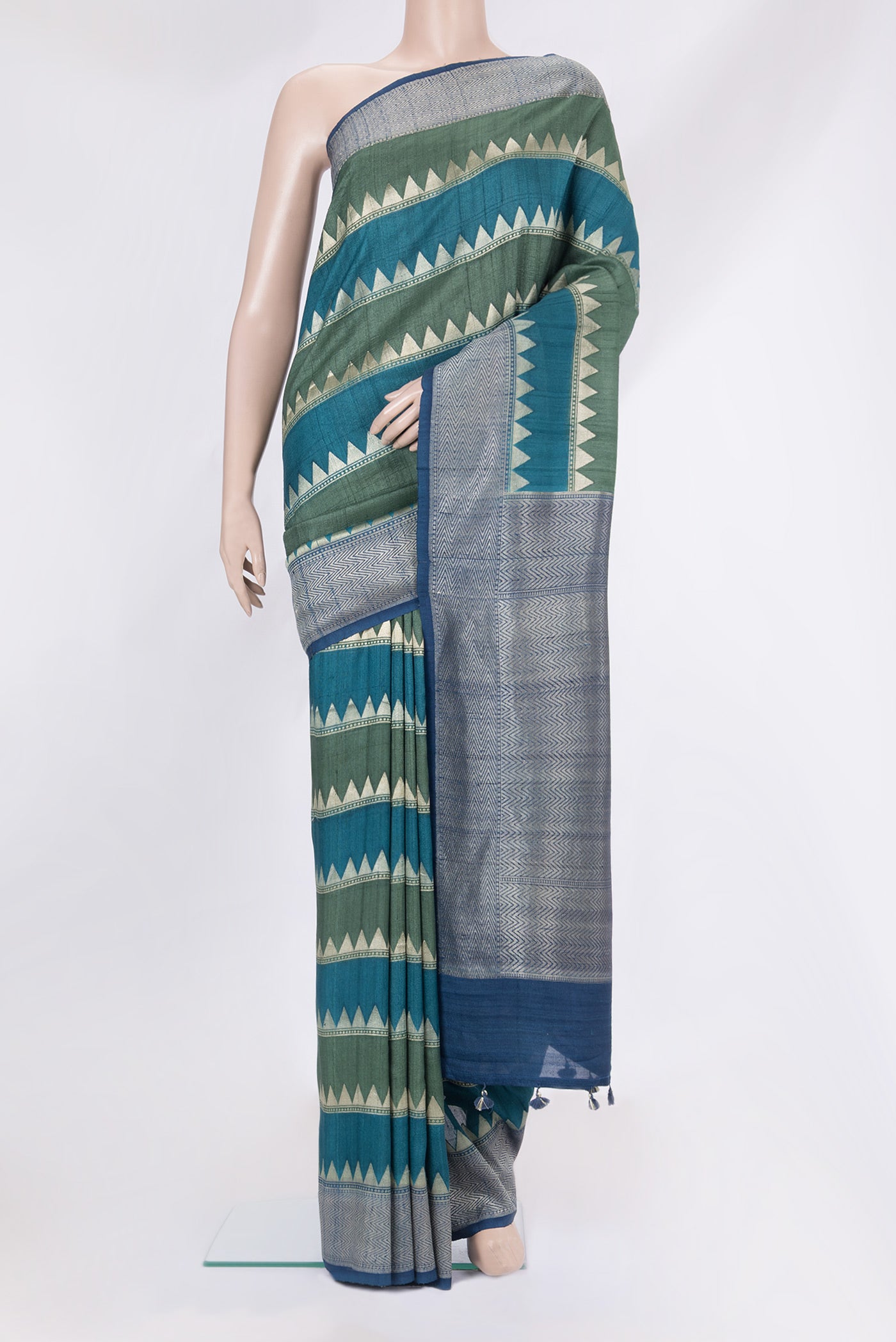 Multi Color Tussar Silk Saree with Stripes on the body and Zari Border.  displayed on a mannequin