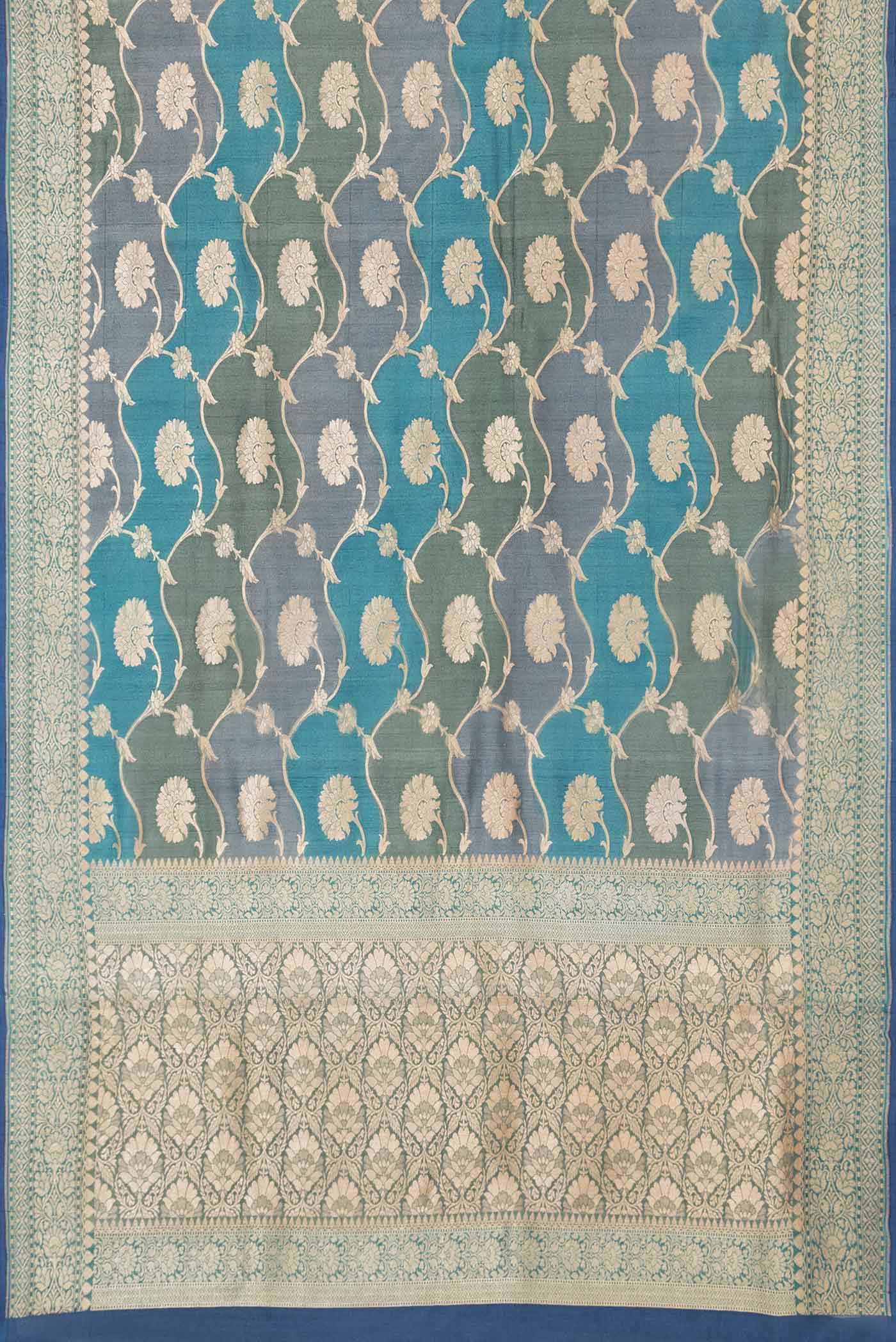 Flat view of Peacock Blue Dual Tone Banarasi Georgette Saree with Zari Brocade on the body and Zari Border