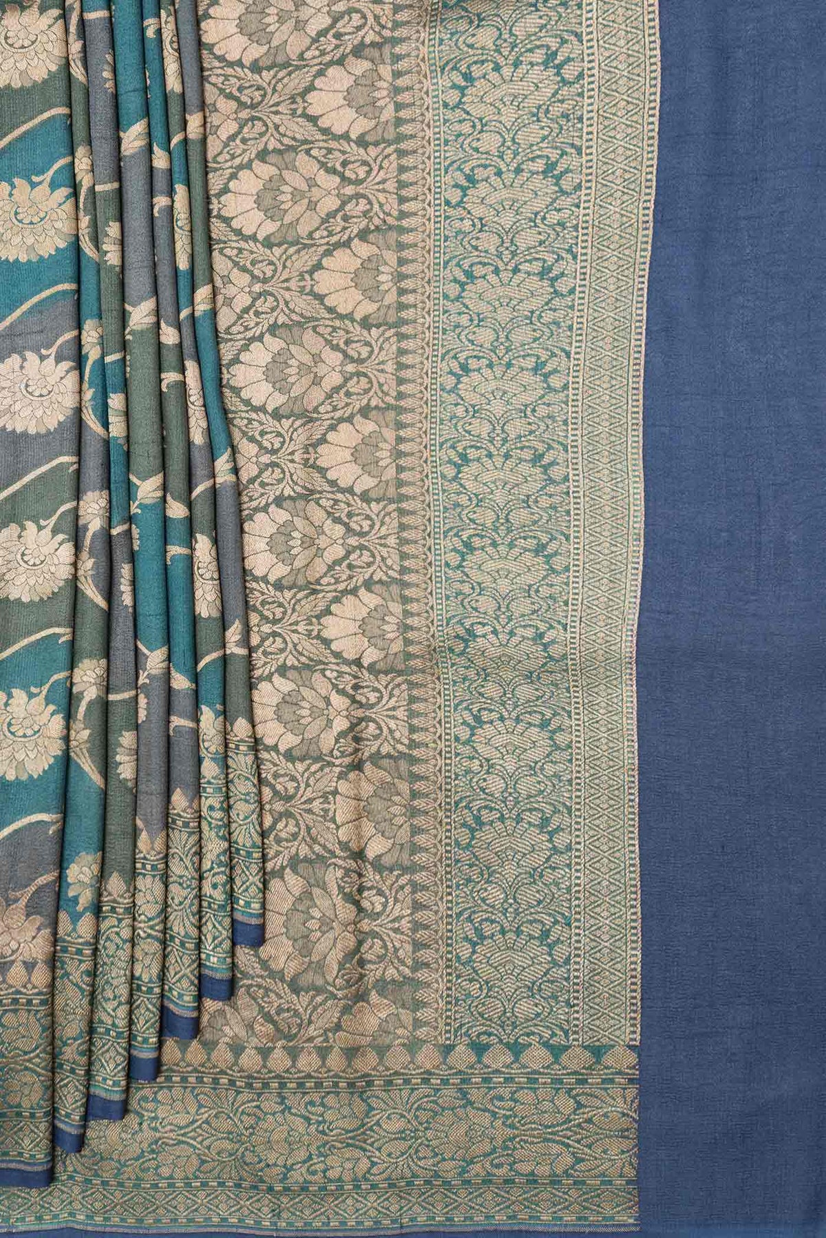 Pleats and pallu of Peacock Blue Dual Tone Banarasi Georgette Saree with Zari Brocade on the body and Zari Border