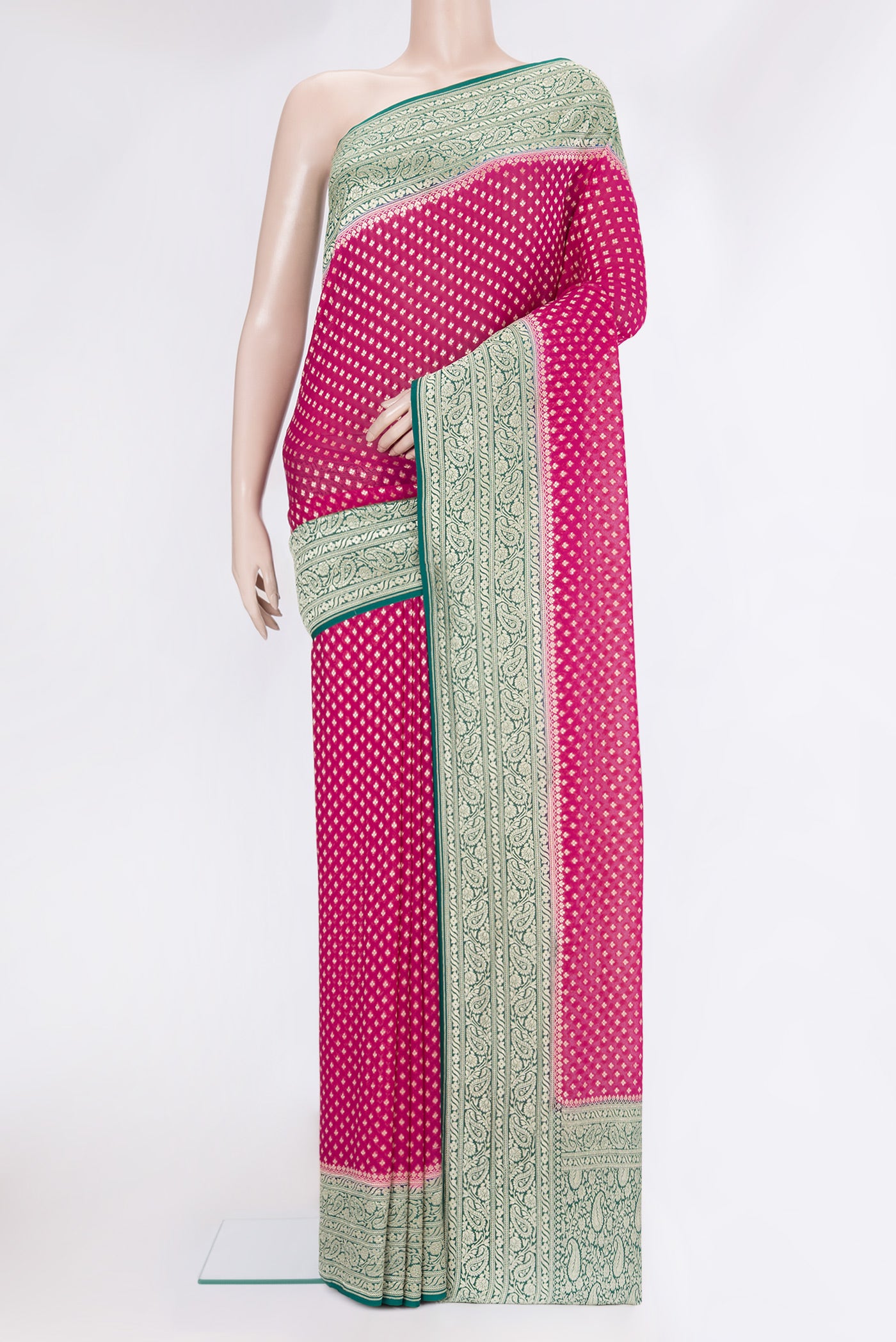 Pink Banarasi Georgette Saree with Zari Brocade on the body and Zari Border.  displayed on a mannequin