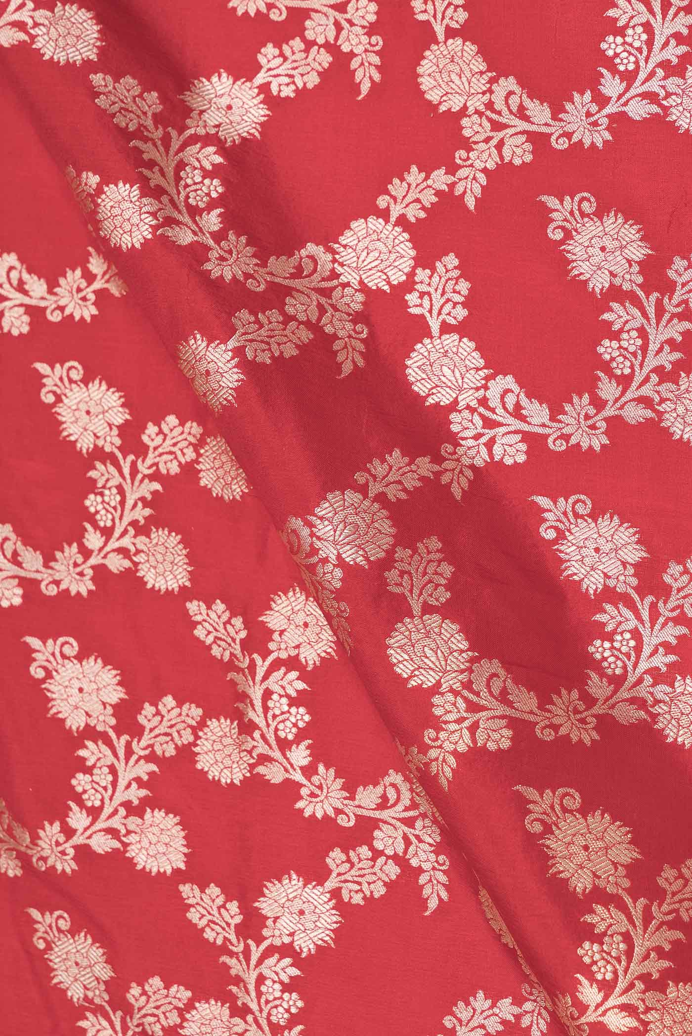 Close up of Red Dual Tone Banarasi Silk Saree with Zari Brocade on the body and Zari Border displaying folds