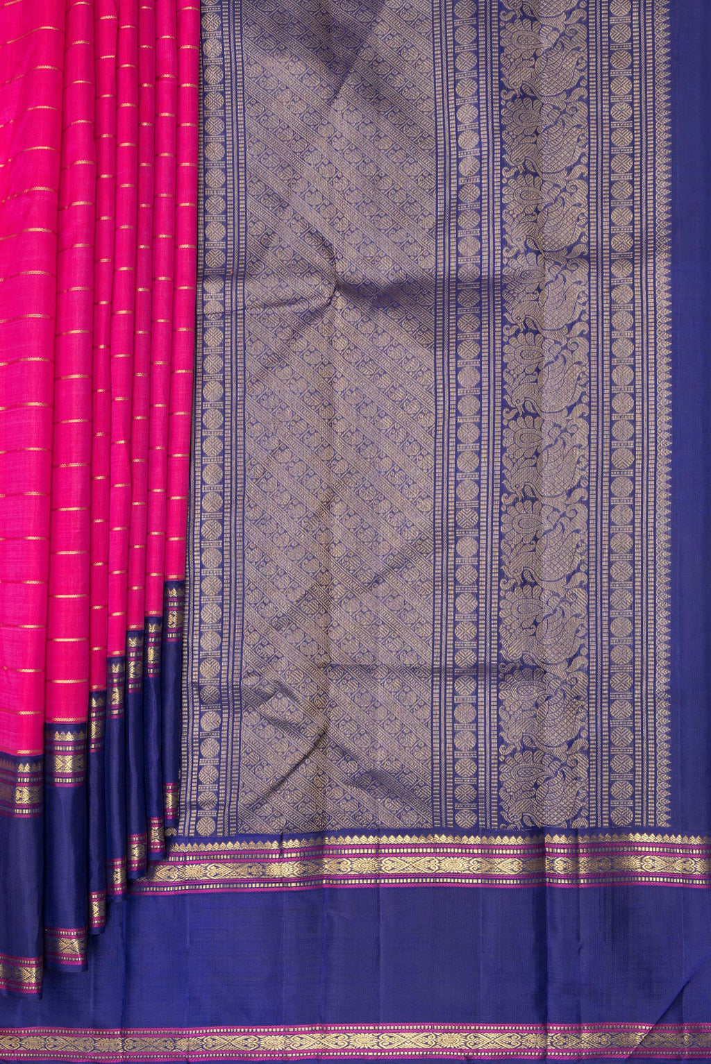 Pleats and pallu of Pure Silk Dark Pink Kanjivaram Saree with Stripes on the body and Zari Border. 