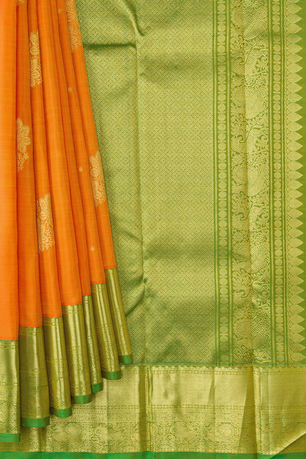 Pleats and pallu of Orange Dual Tone Kanjivaram Silk Saree with Zari Butta on the body and Zari Border. 