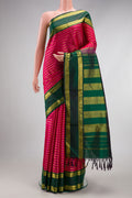 Dark Pink Kanchipuram Silk Nine Yards Saree with Stripes on the body and Zari Border.  displayed on a mannequin