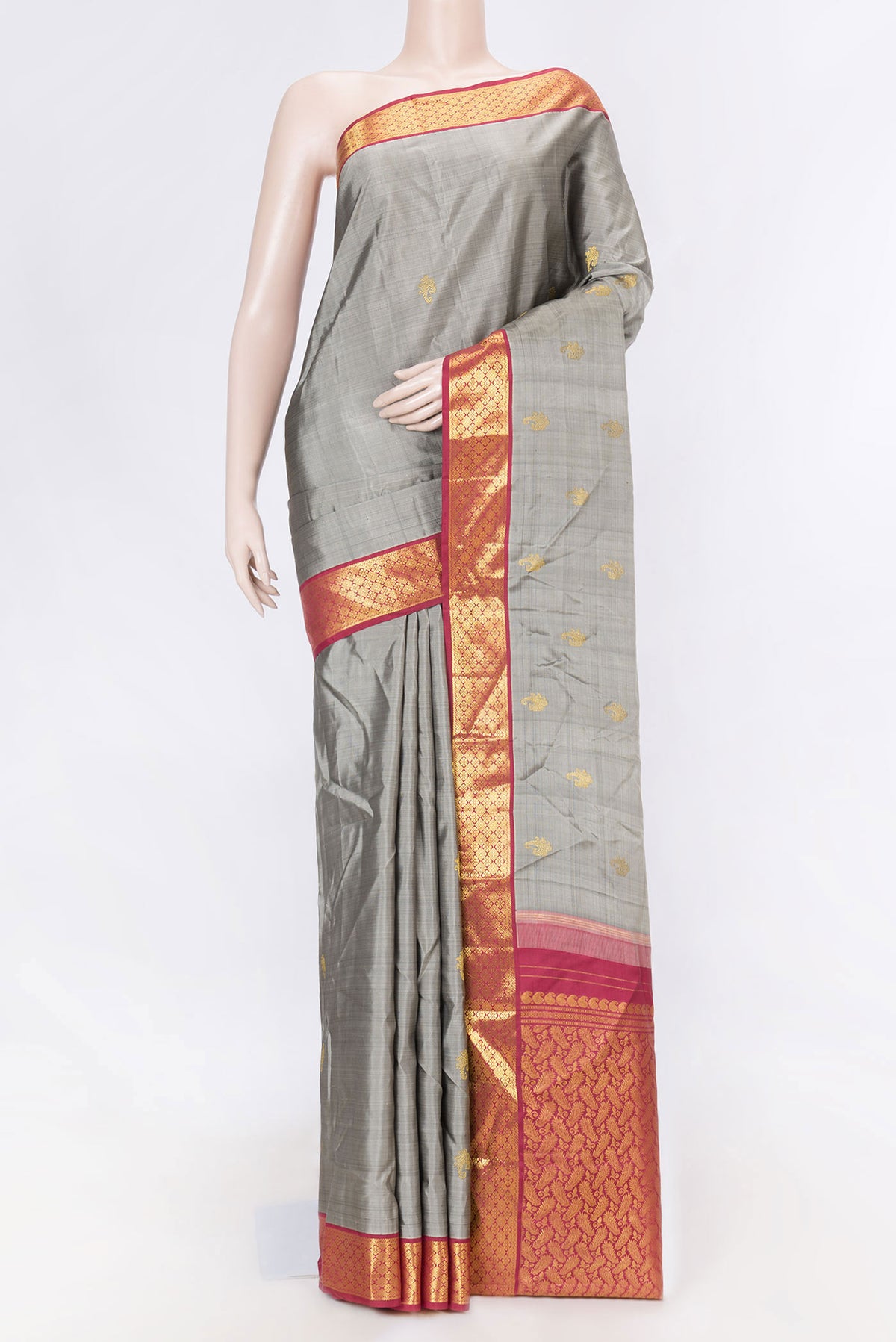 Grey Dual Tone Kanchipuram Saree with Zari Butta on the body and Zari Border displayed on a mannequin