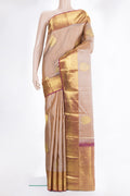 Pure Silk Beige Dual Tone Kanchipuram Saree with Jacquard With Zari Butta on the body and Zari Border.  displayed on a mannequin