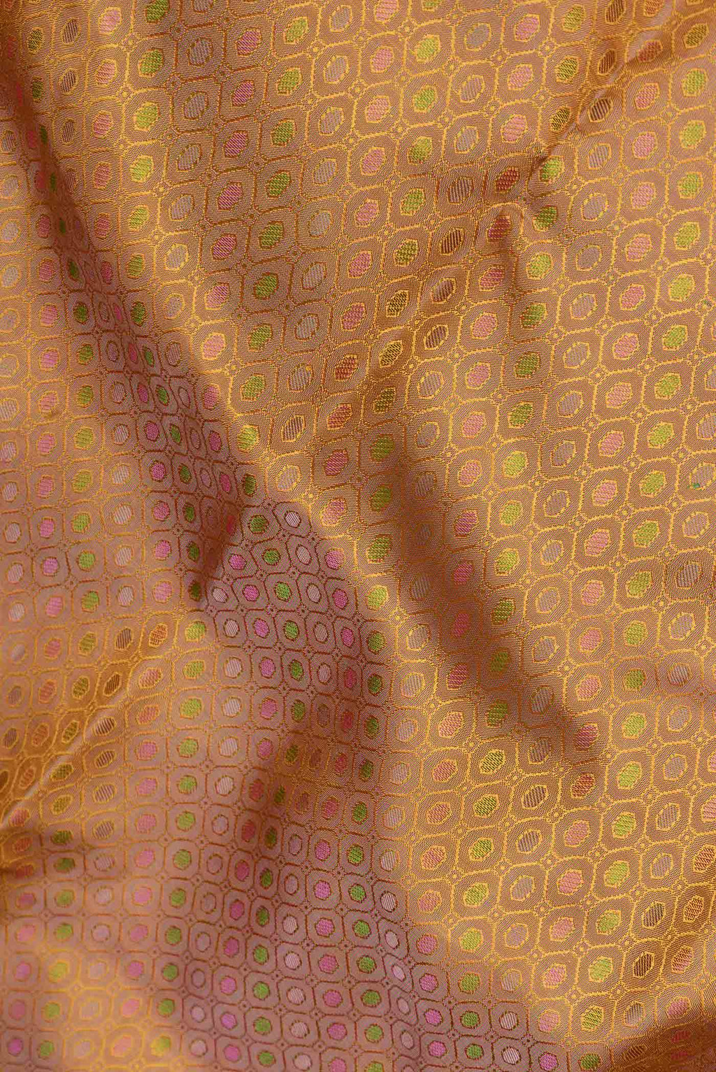 Close up of Pure Silk Pure Zari Mustard Dual Tone Kanchipuram Saree with Jacquard design on the body and Zari Border displaying folds