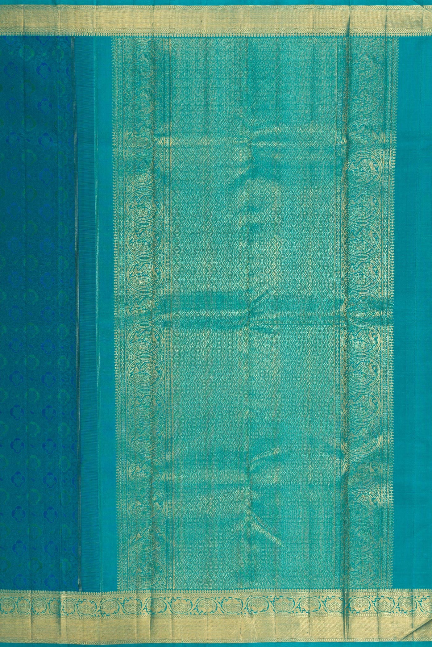 Close up image of the pallu of Pure Silk Pure Zari Peacock Blue Kanchipuram Saree with Jacquard design on the body and Zari Border. 