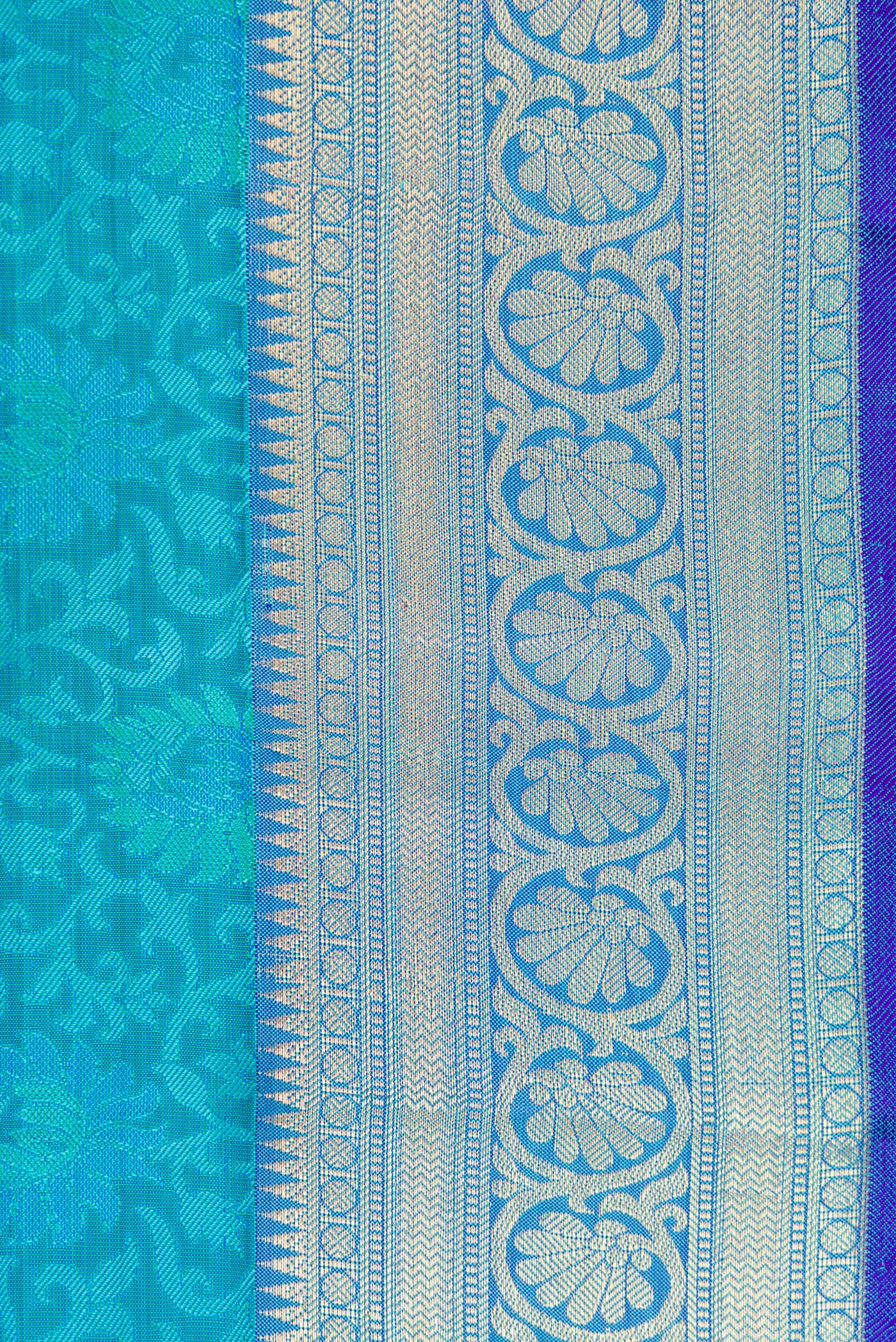 Border image of Sky Blue Dual Tone Kanchipuram Silk Saree with Jacquard design on the body and Zari Border. 