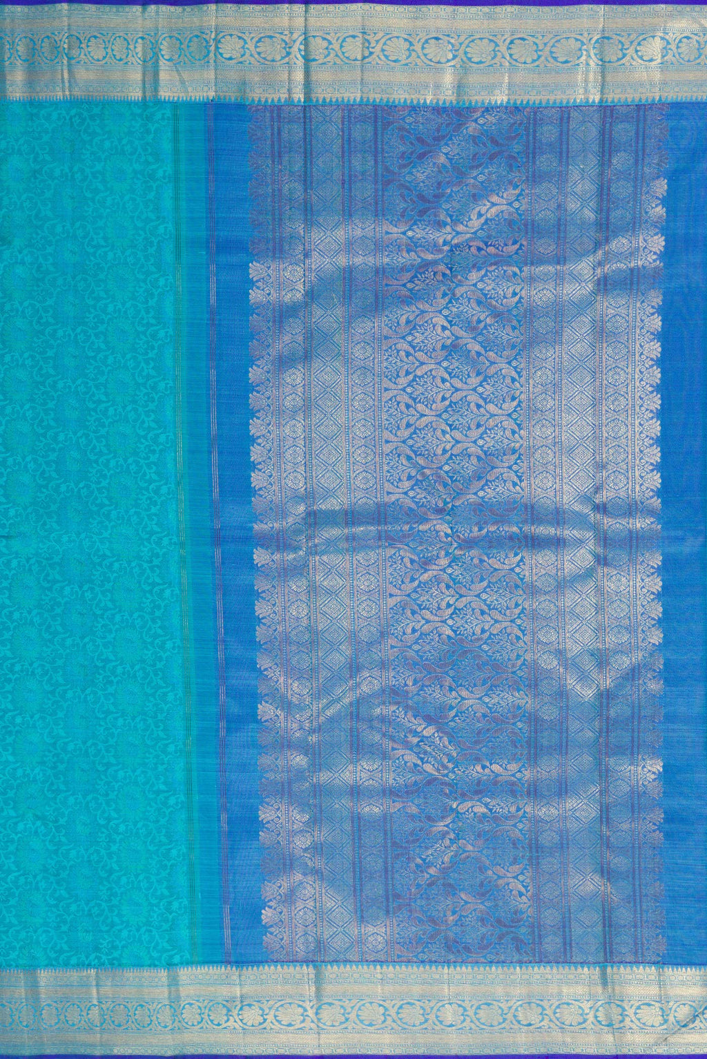 Close up image of the pallu of Sky Blue Dual Tone Kanchipuram Silk Saree with Jacquard design on the body and Zari Border. 