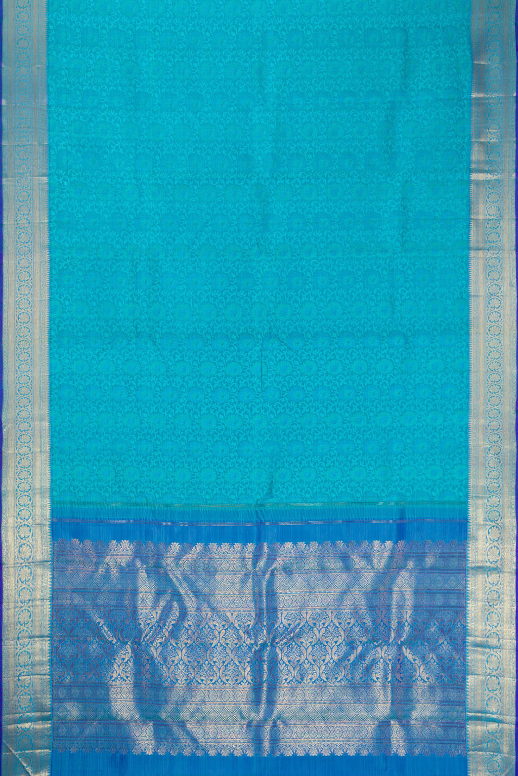 Flat view of Sky Blue Dual Tone Kanchipuram Silk Saree with Jacquard design on the body and Zari Border. 