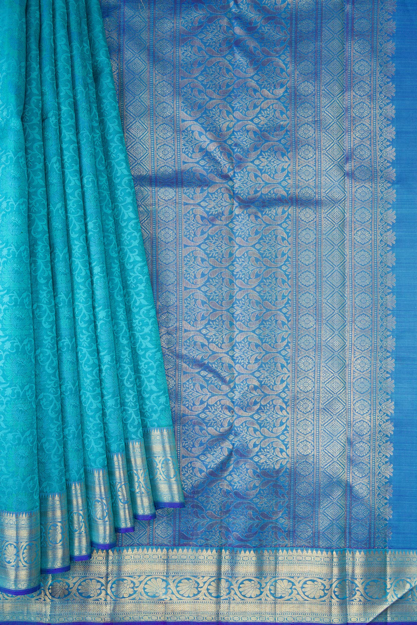 Pleats and pallu of Sky Blue Dual Tone Kanchipuram Silk Saree with Jacquard design on the body and Zari Border. 