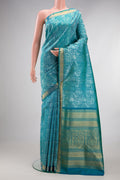 Pure Silk Pure Zari Peacock Blue Dual Tone Kanchipuram Saree with Jacquard design on the body and Zari Border.  displayed on a mannequin