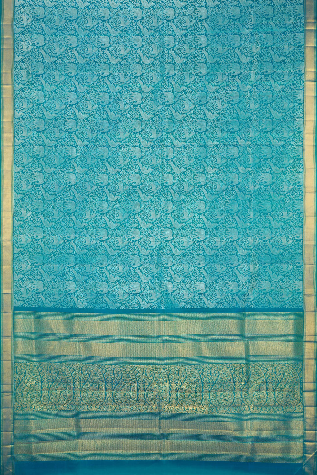 Flat view of Pure Silk Pure Zari Peacock Blue Dual Tone Kanchipuram Saree with Jacquard design on the body and Zari Border. 