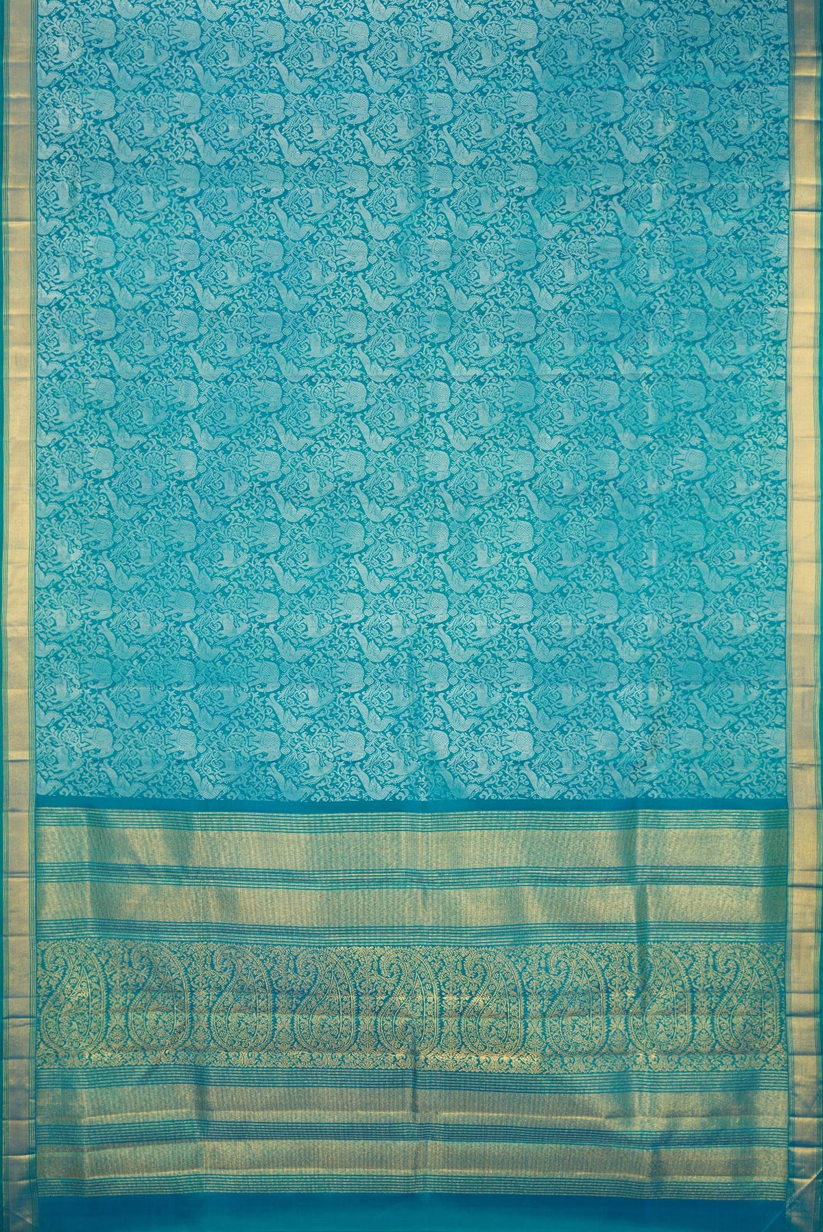 Flat view of Pure Silk Pure Zari Peacock Blue Dual Tone Kanchipuram Saree with Jacquard design on the body and Zari Border. 