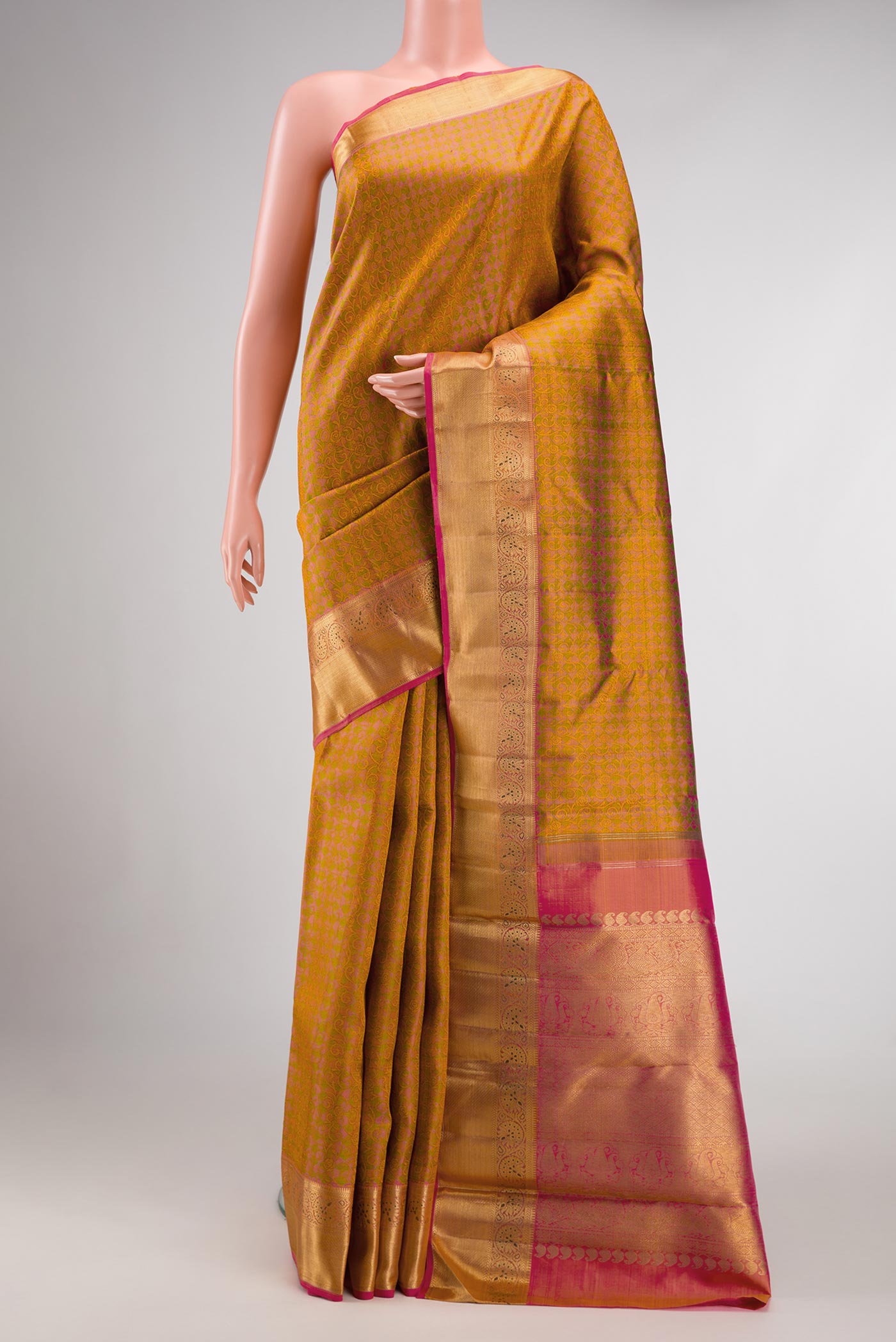 Pure Silk Pure Zari Pink Dual Tone Kanchipuram Saree with Jacquard design on the body and Zari Border.  displayed on a mannequin
