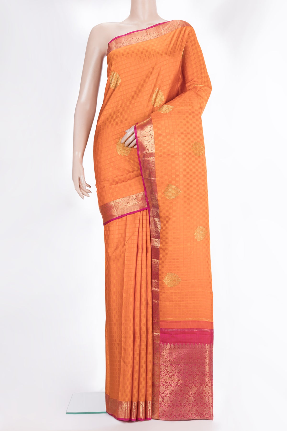 Pure Silk Orange Kanchipuram Saree with Jacquard With Zari Butta on the body and Zari Border.  displayed on a mannequin