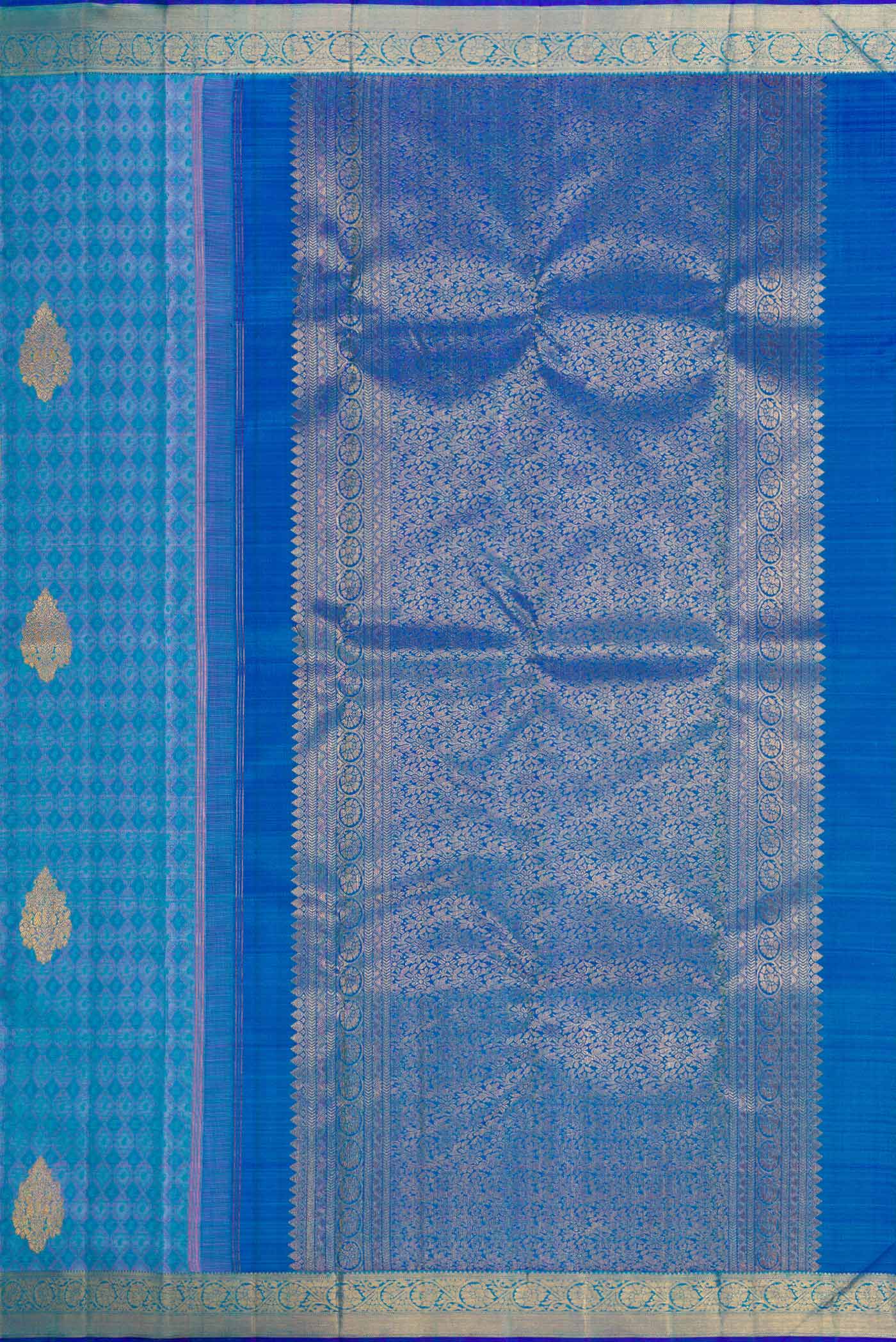 Close up image of the pallu of Pure Silk Pure Zari Peacock Blue Dual Tone Kanchipuram Saree with Jacquard With Zari Butta on the body and Zari Border. 