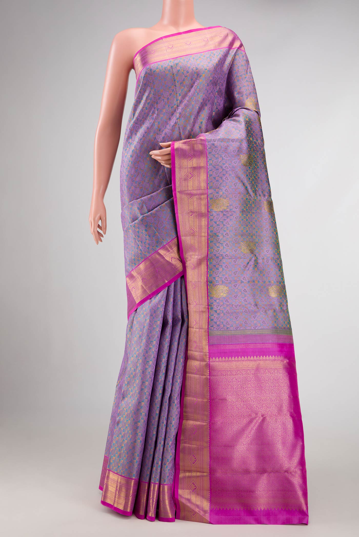 Pure Silk Pure Zari Lavender Dual Tone Kanchipuram Saree with Jacquard With Zari Butta on the body and Zari Border.  displayed on a mannequin