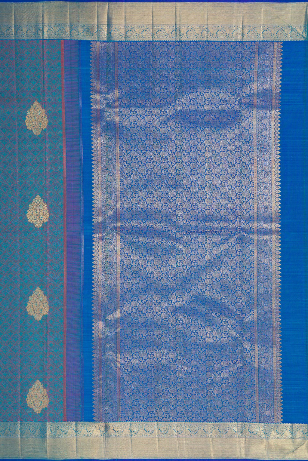 Close up image of the pallu of Pure Silk Pure Zari Peacock Blue Dual Tone Kanchipuram Saree with Jacquard With Zari Butta on the body and Zari Border. 