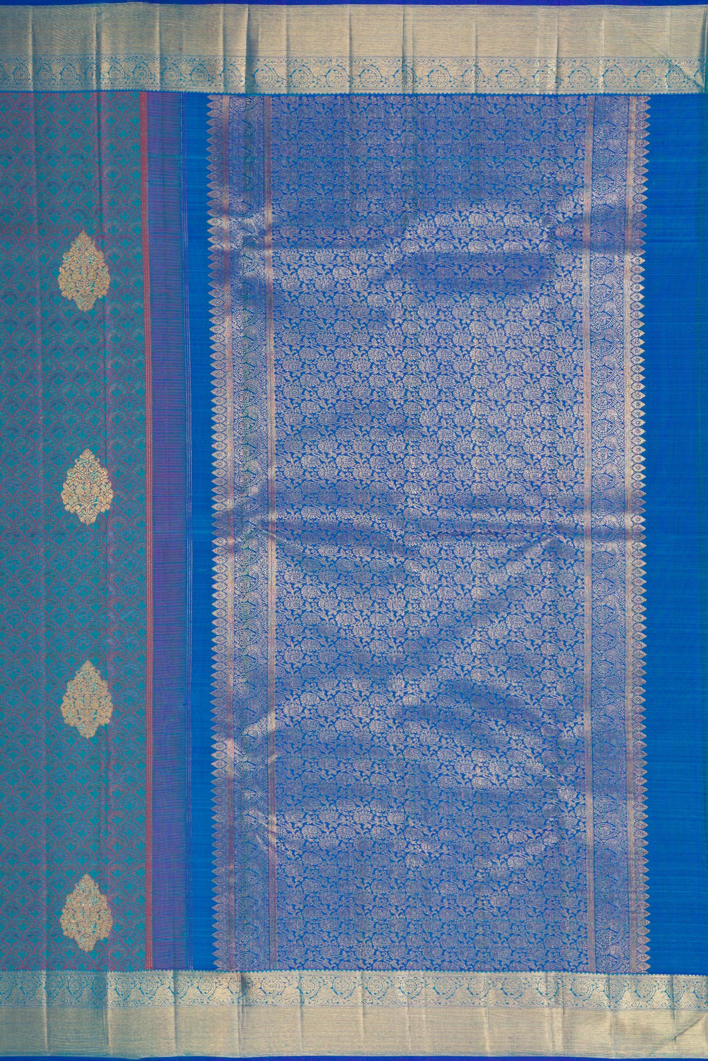Close up image of the pallu of Pure Silk Pure Zari Peacock Blue Dual Tone Kanchipuram Saree with Jacquard With Zari Butta on the body and Zari Border. 