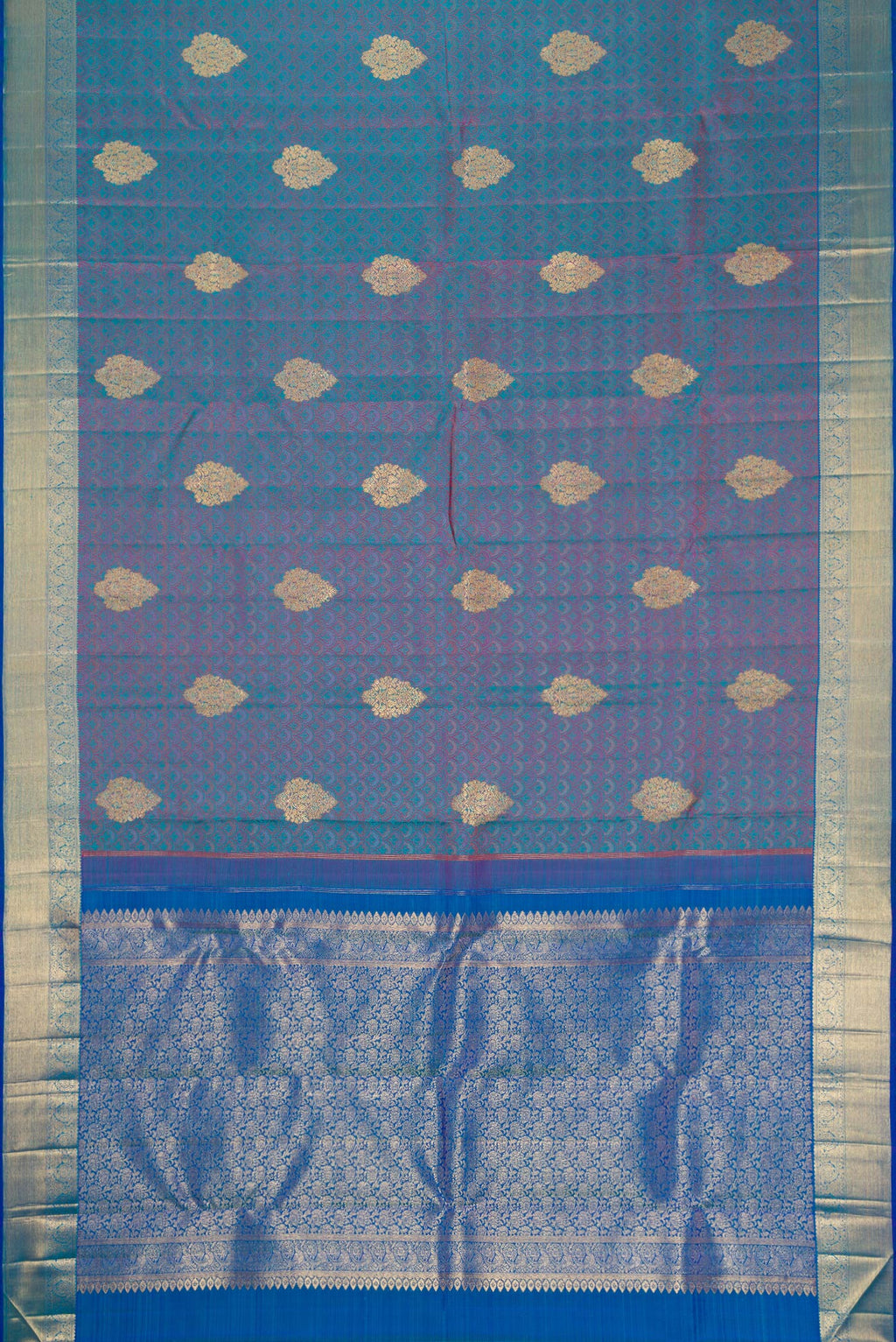 Flat view of Pure Silk Pure Zari Peacock Blue Dual Tone Kanchipuram Saree with Jacquard With Zari Butta on the body and Zari Border. 