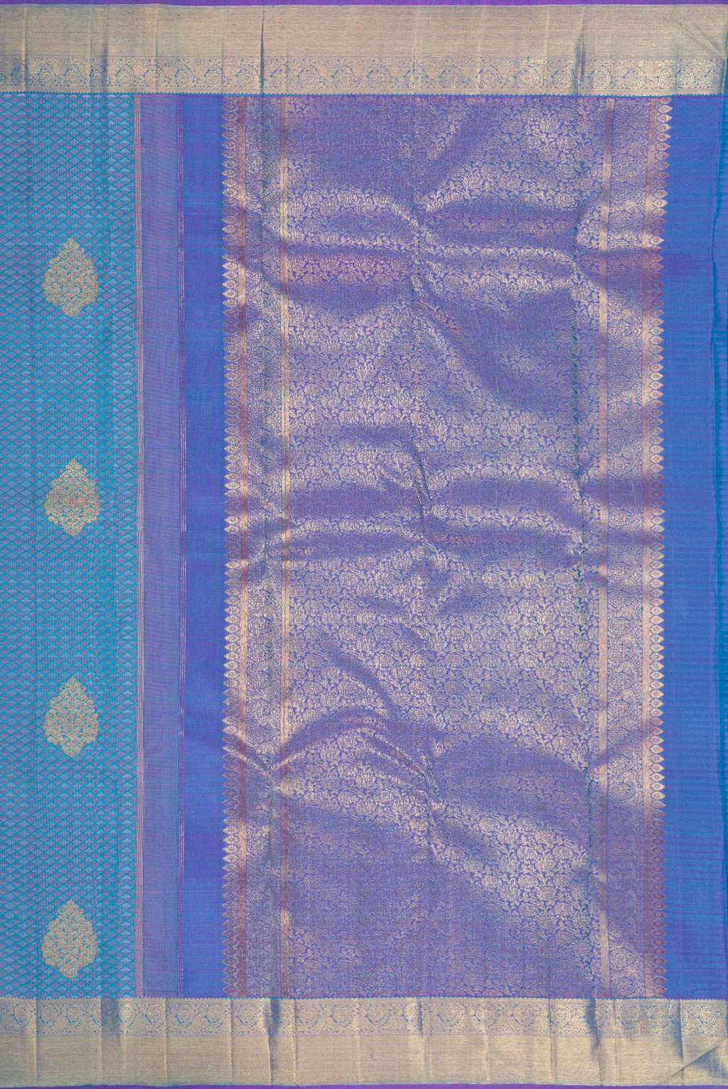 Close up image of the pallu of Pure Silk Pure Zari Light Blue Dual Tone Kanchipuram Saree with Jacquard With Zari Butta on the body and Zari Border. 