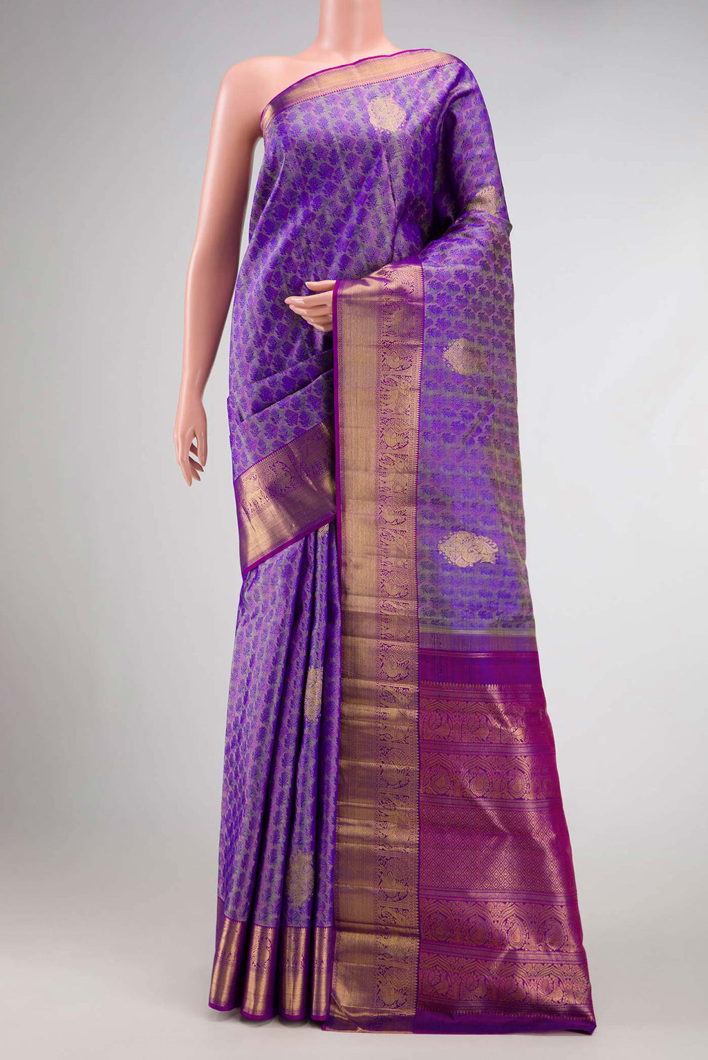 Pure Silk Pure Zari Purple Dual Tone Kanchipuram Saree with Jacquard With Zari Butta on the body and Zari Border.  displayed on a mannequin