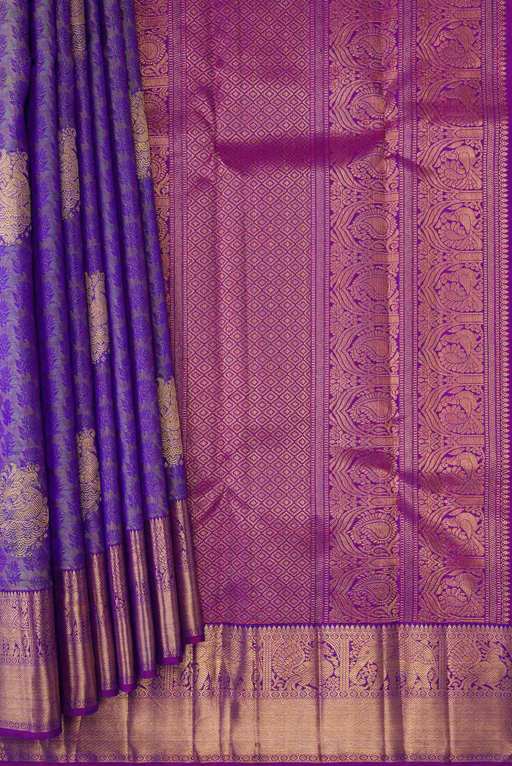 Pleats and pallu of Pure Silk Pure Zari Purple Dual Tone Kanchipuram Saree with Jacquard With Zari Butta on the body and Zari Border. 