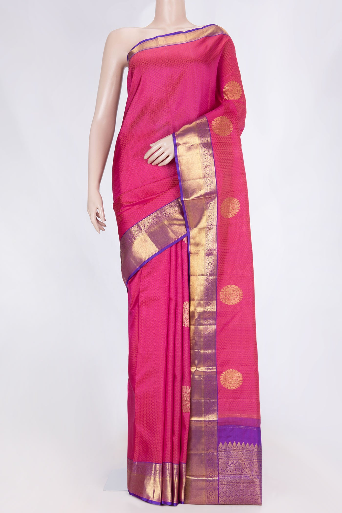 Pink Dual Tone Kanchipuram Saree with Jacquard With Zari Butta on the body and Zari Border displayed on a mannequin