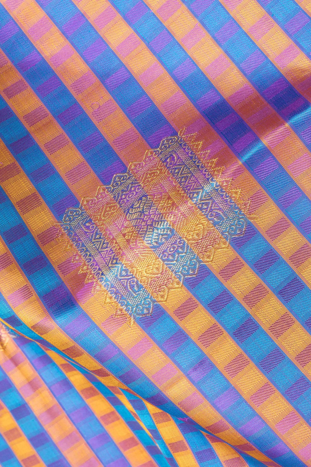 Close up of Pure Silk Multi Color Kanchipuram Saree with Jacquard With Zari Butta on the body and Zari Border.  displaying folds