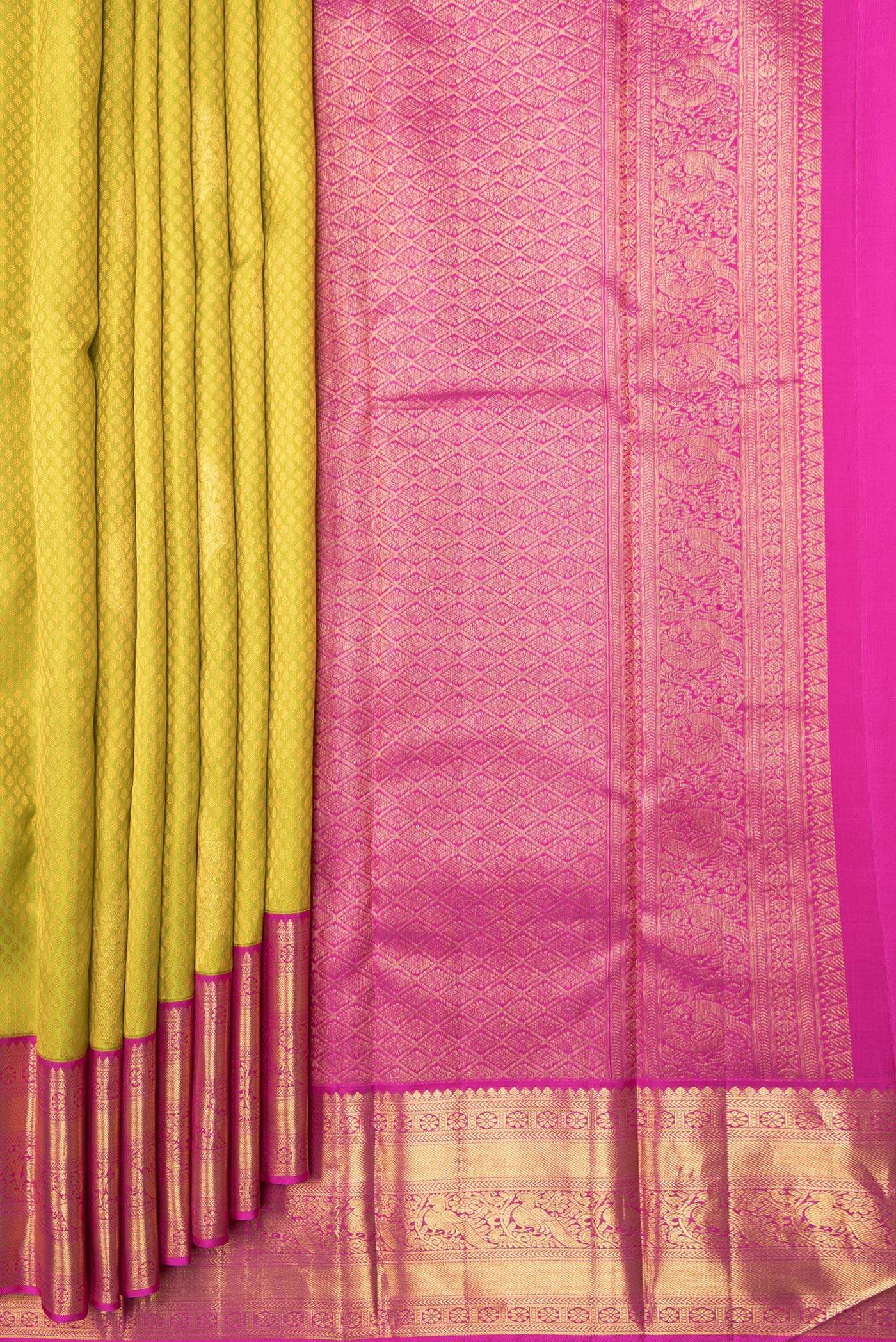 Pleats and pallu of Parrot Green Dual Tone Kanjivaram Silk Saree with Jacquard With Zari Butta on the body and Zari Border. 