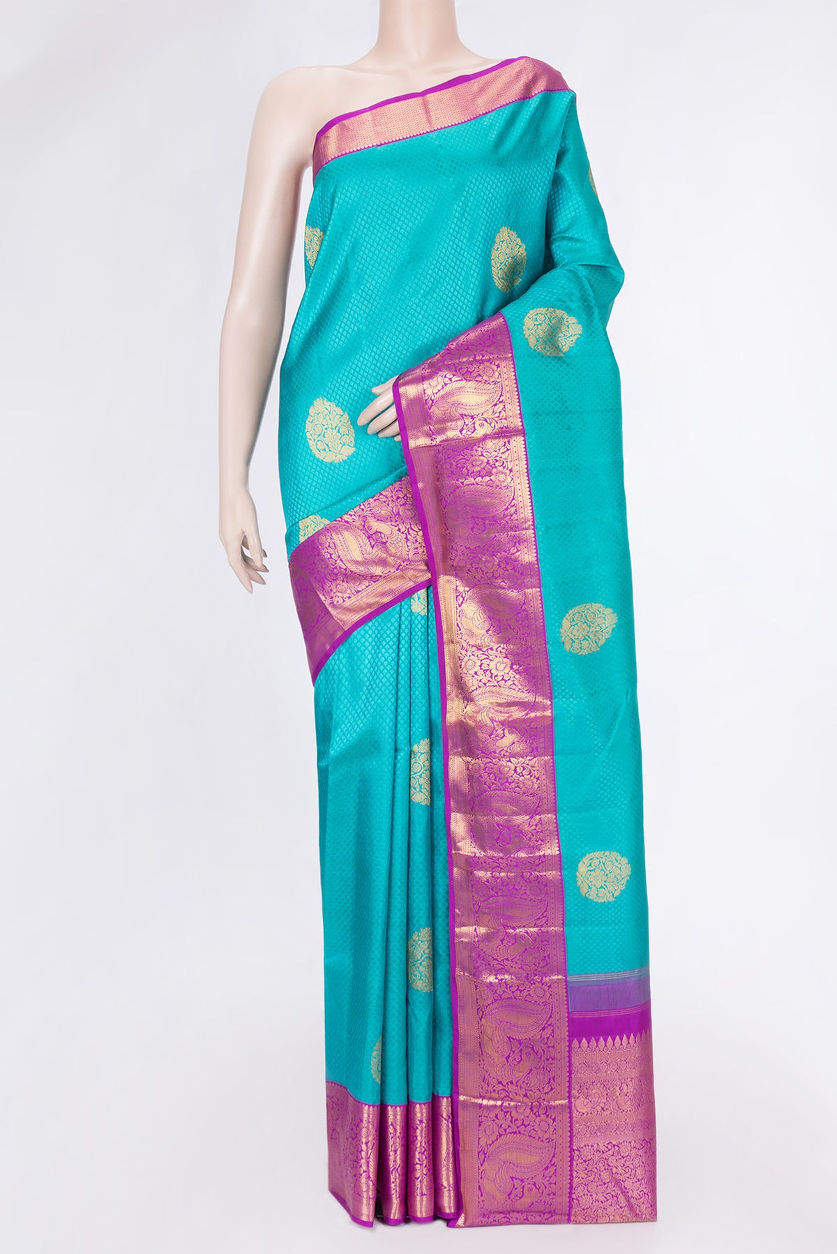 Sea Green Dual Tone Kanjivaram Silk Saree with Jacquard With Zari Butta on the body and Zari Border.  displayed on a mannequin