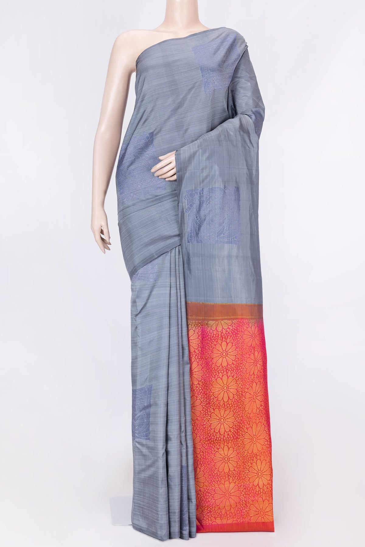 Grey Dual Tone Kanchipuram Saree with Zari Butta on the body and Without Border displayed on a mannequin
