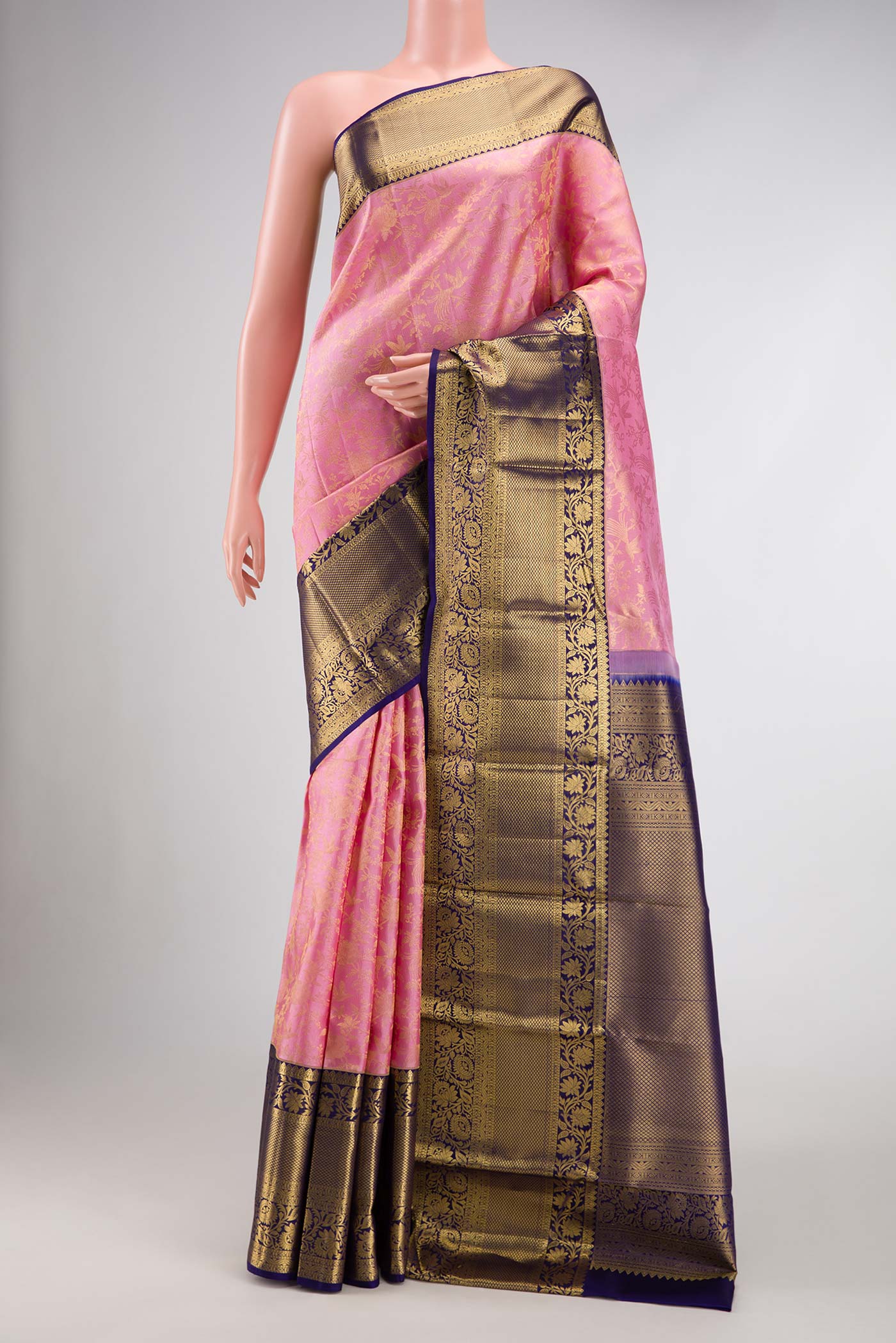 Pink Dual Tone Kanchipuram Silk Saree with Zari Brocade on the body and Zari Border.  displayed on a mannequin