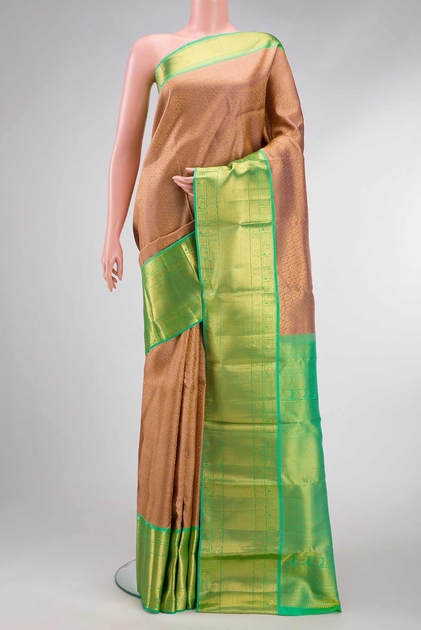 Rose Gold Dual Tone Kanchipuram Silk Saree with Zari Brocade on the body and Zari Border.  displayed on a mannequin