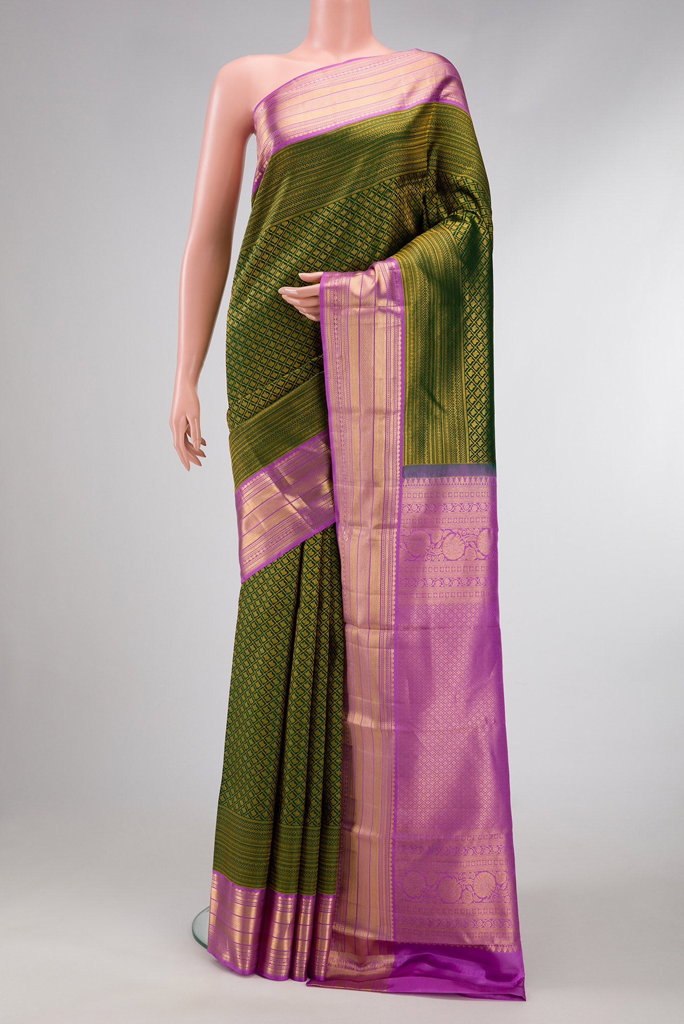 Bottle Green Dual Tone Kanchipuram Silk Saree with Zari Brocade on the body and Zari Border.  displayed on a mannequin
