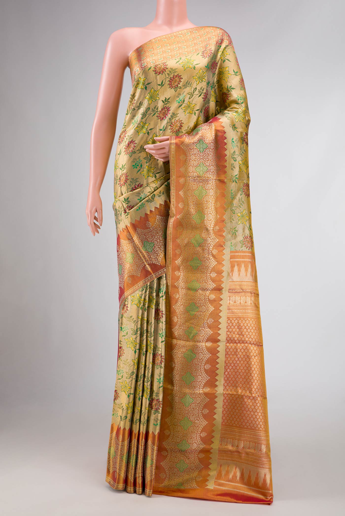 Green Dual Tone Kanjivaram Tissue Silk Saree with Zari Brocade on the body and Zari Border.  displayed on a mannequin