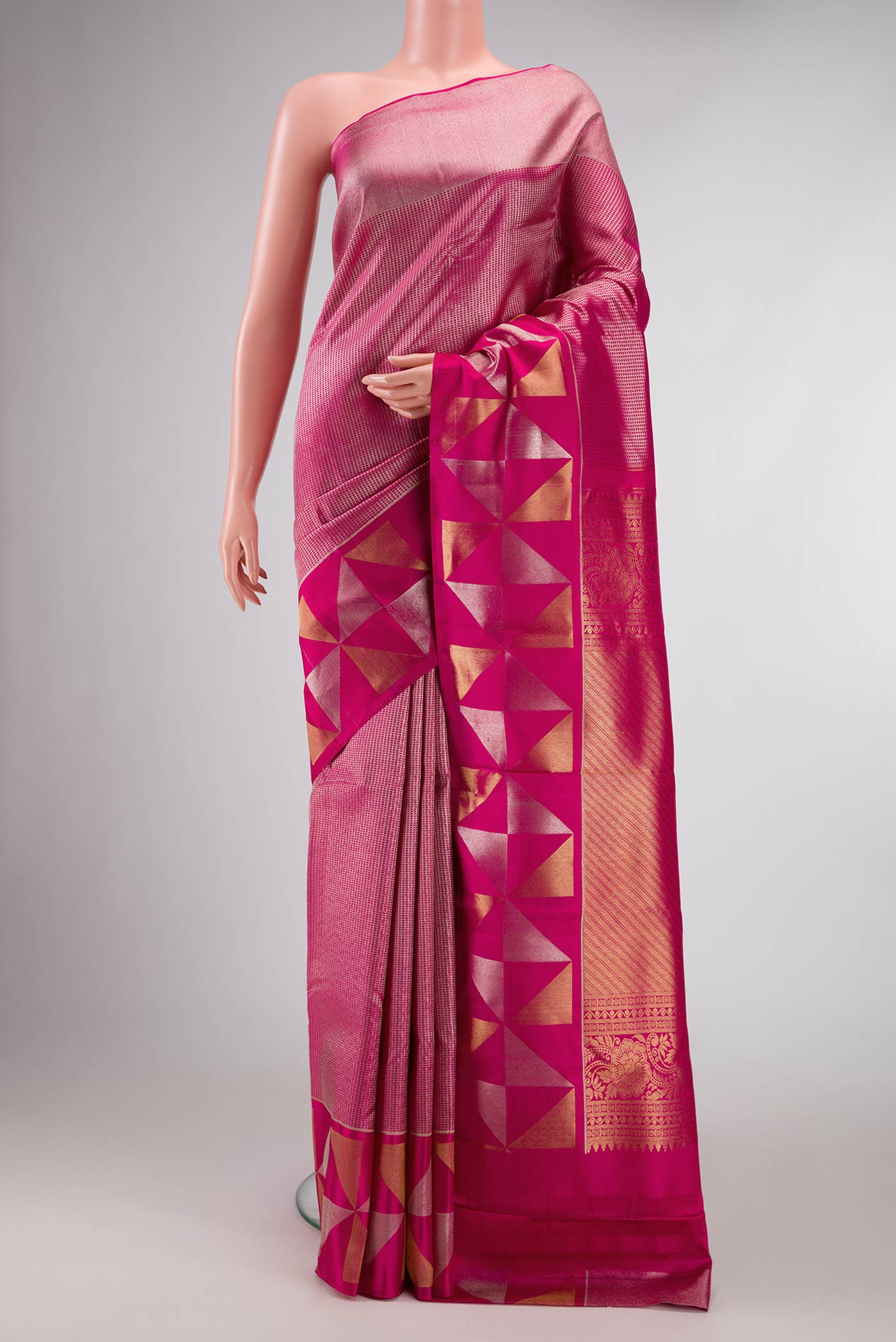 Pink Dual Tone Kanchipuram Saree with Zari Brocade on the body and Zari Border displayed on a mannequin