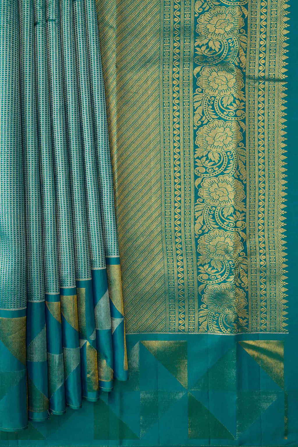 Pleats and pallu of Peacock Blue Dual Tone Kanchipuram Silk Saree with Zari Brocade on the body and Fancy Border