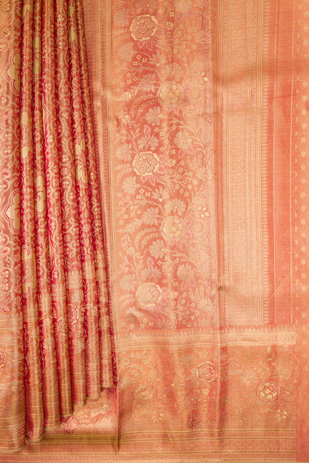 Pleats and pallu of Pink Dual Tone Kanchipuram Tissue Silk Saree with Zari Brocade on the body and Zari Border. 