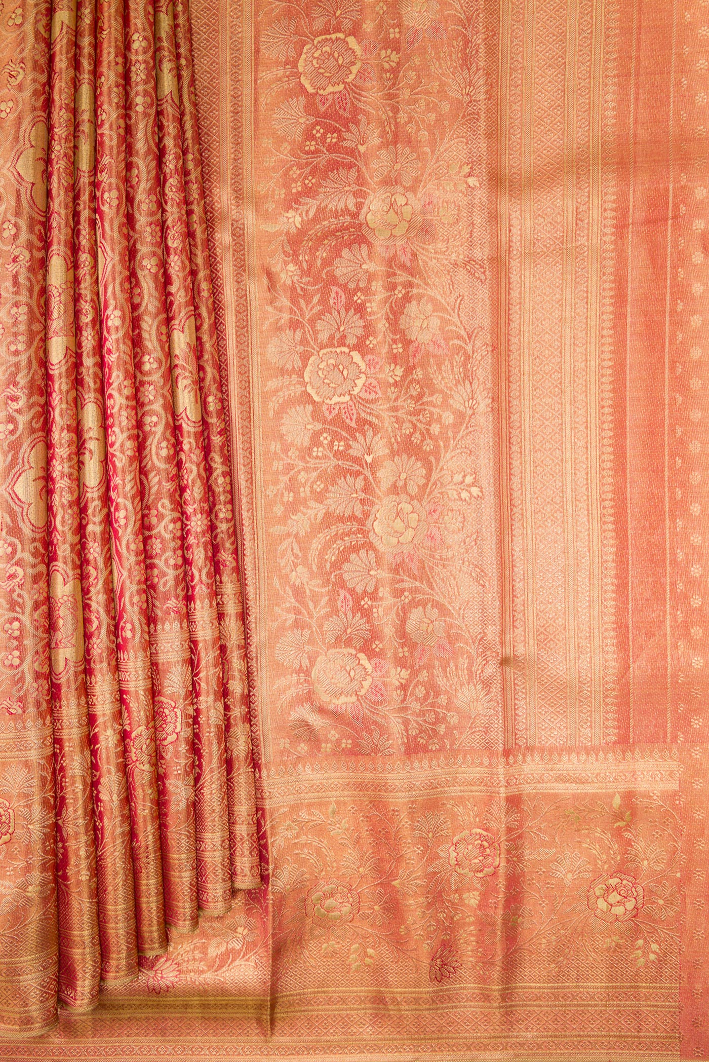 Pleats and pallu of Pink Dual Tone Kanchipuram Tissue Silk Saree with Zari Brocade on the body and Zari Border. 