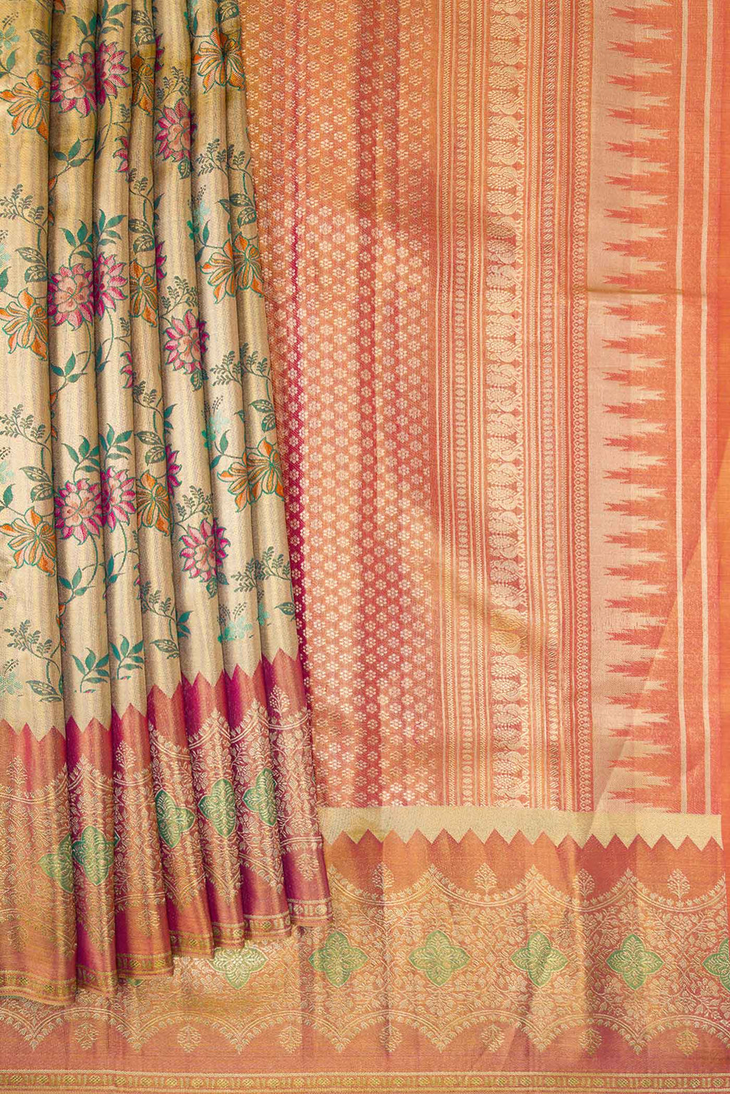 Pleats and pallu of Gold Dual Tone Kanjivaram Tissue Silk Saree with Zari Brocade on the body and Zari Border. 